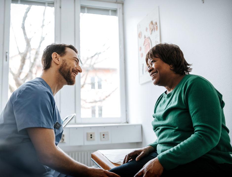 Healthcare professional consulting with patient